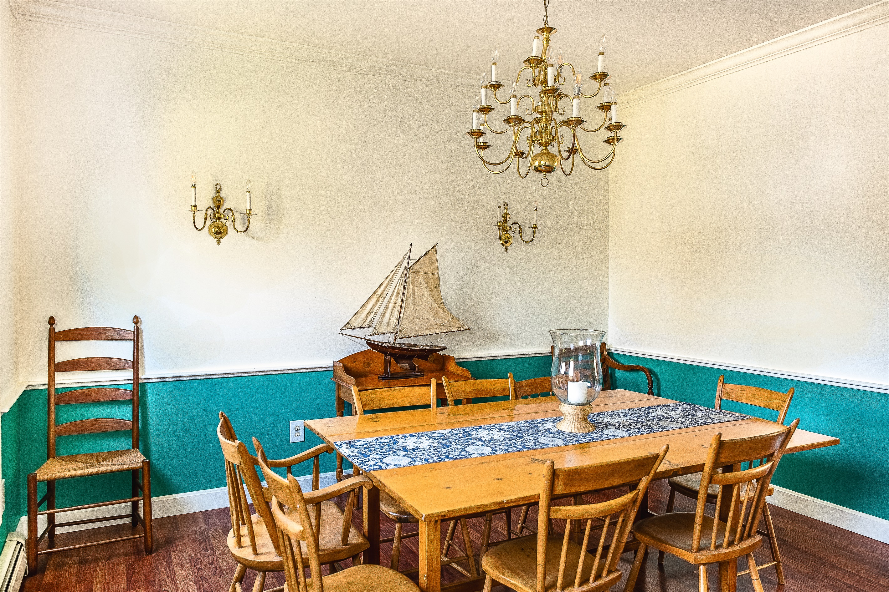 Gather for a full lobster dinner in the formal dining room, which comfortably seats up to eight. This dedicated space is ideal for group meals and holiday celebrations after a day of hiking the nearby trails of Acadia National Park.