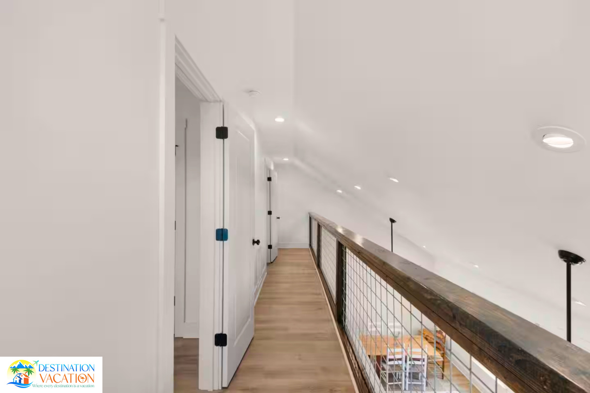 Clean lines and natural light create a serene hallway.