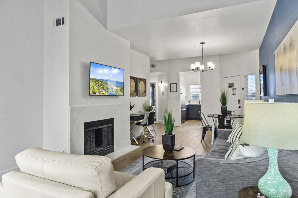 Open living and dining layout with 4 seats. 