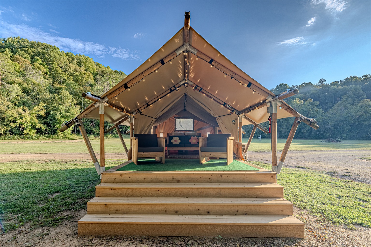 Welcome to Scorpio! Your home away from home. Step up to your luxury tent, where a queen bed awaits behind a spacious deck perfect for morning coffee and enjoying the sounds of nature.