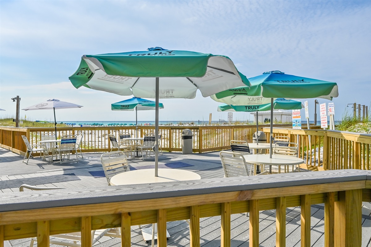 shaded tables near pool area
