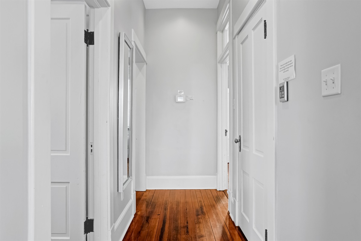 A central hallway connects all bedrooms and living spaces with ease and flow.