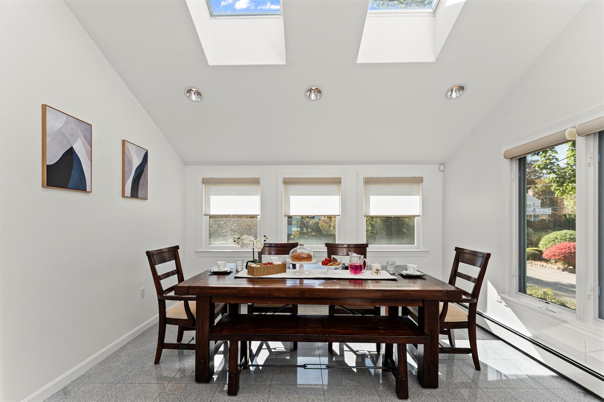Dining area with seating for 8 and additional chairs for your guests.