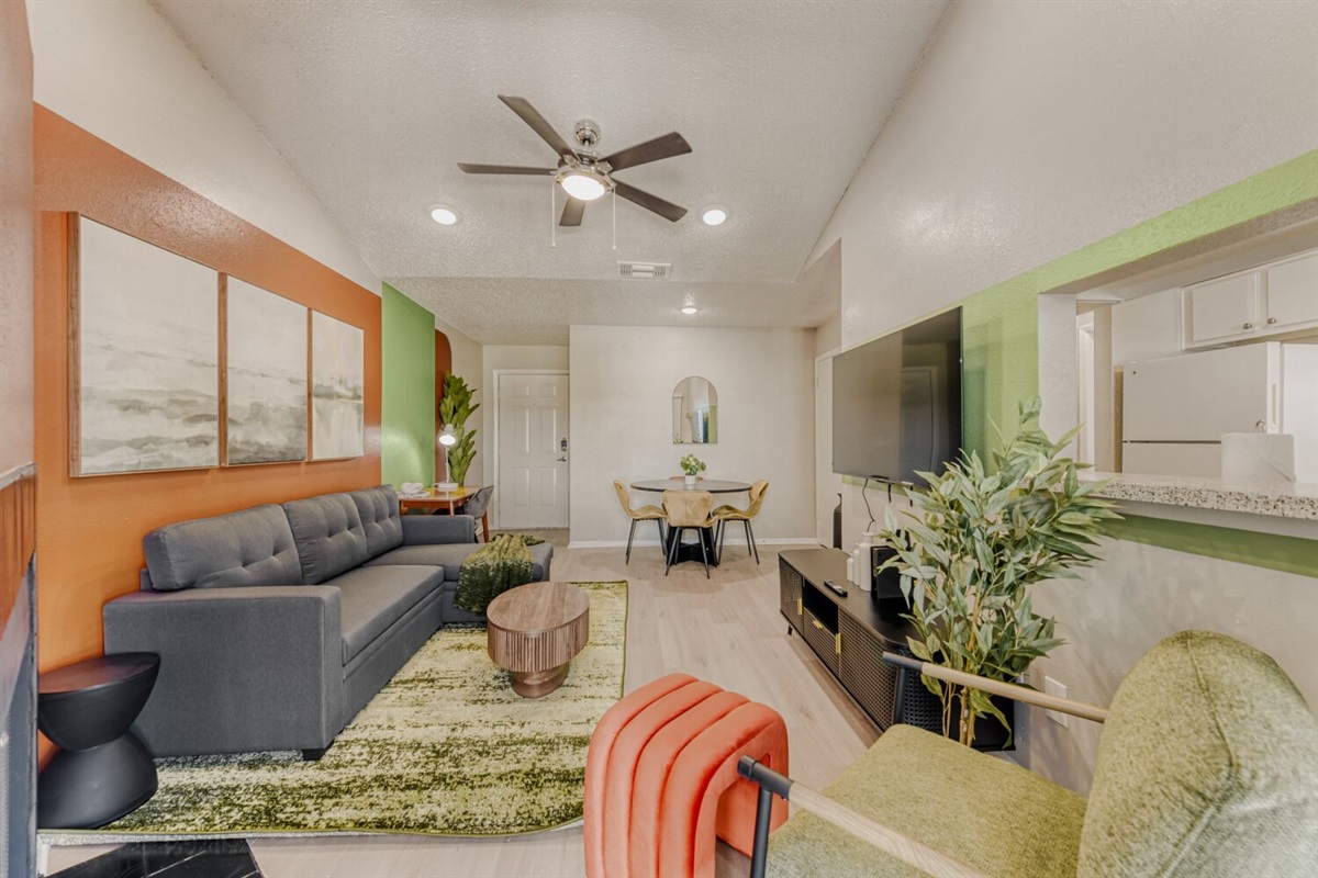 A vibrant mix of color and comfort — this modern living space brings energy and warmth to everyday living.