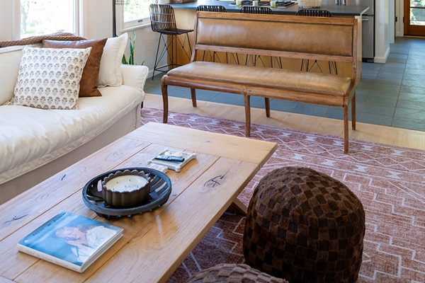 Bright and comfortable living space designed for relaxing after a day in Napa. Smart TV and large sofa couch and bench. Board games included for a night in. 