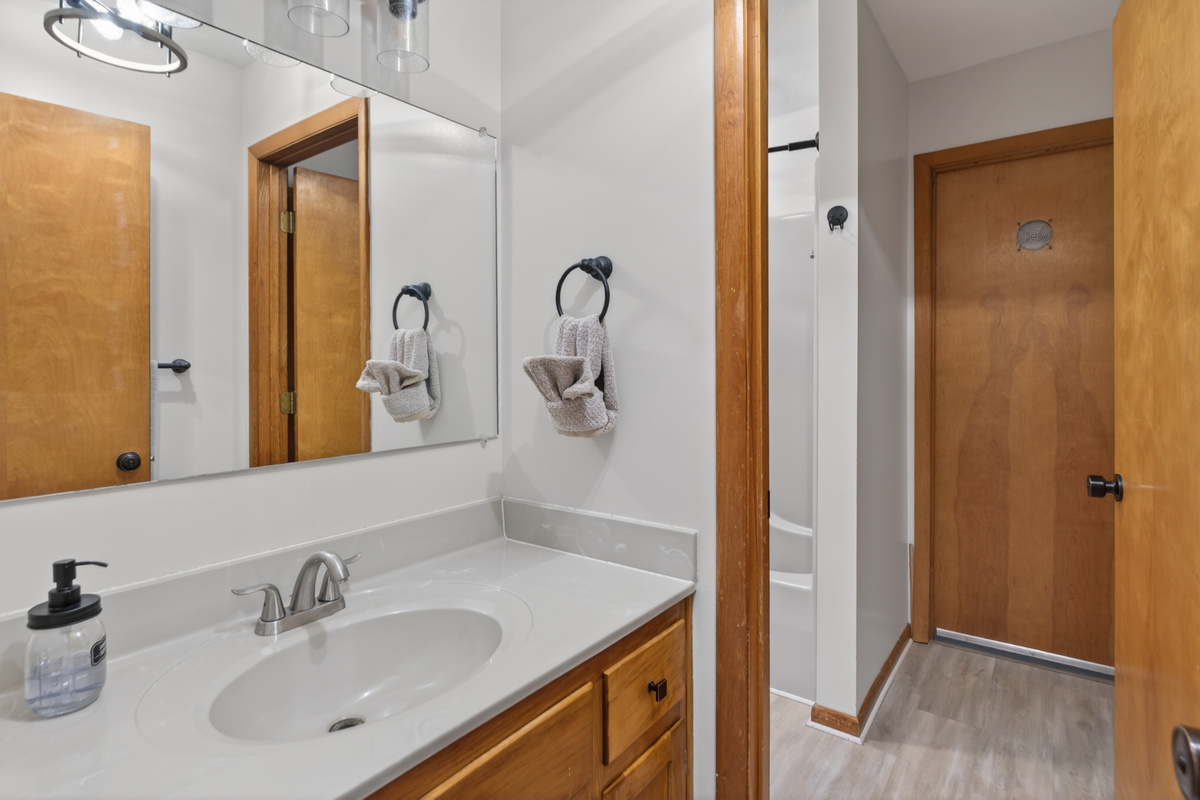 Bathroom Bliss: Bright, modern design with a sleek vanity and plenty of space to refresh!