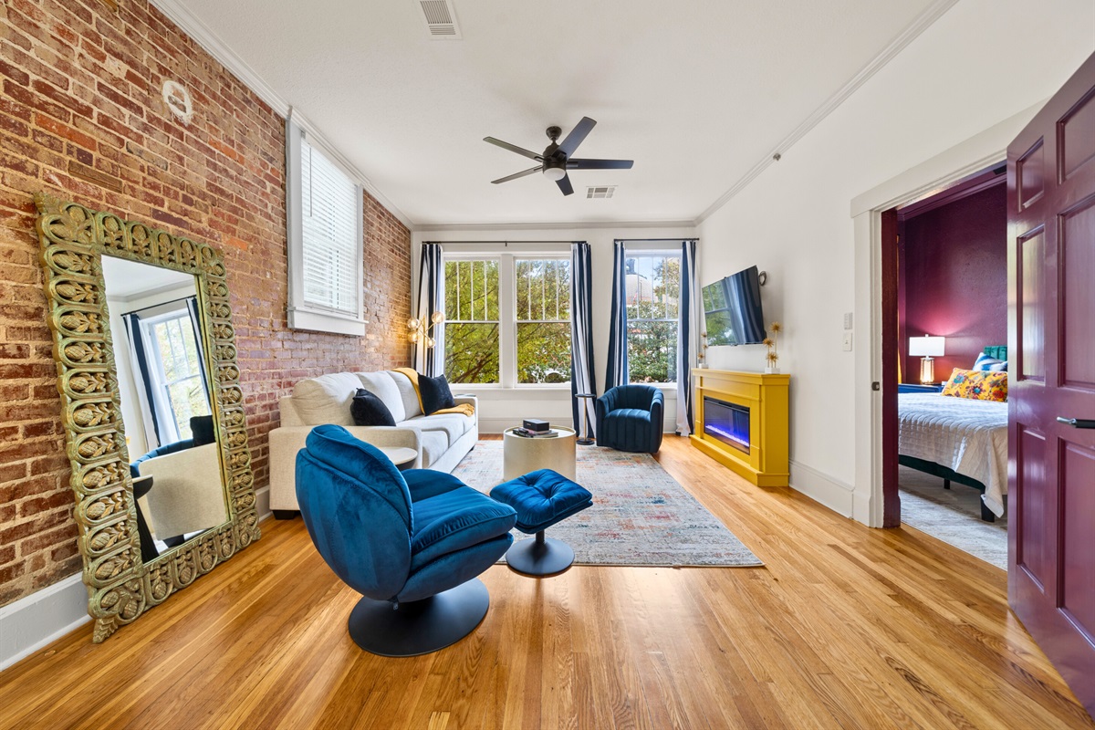 Another view of the living room showcases its stylish details and thoughtful design for comfort and ease.