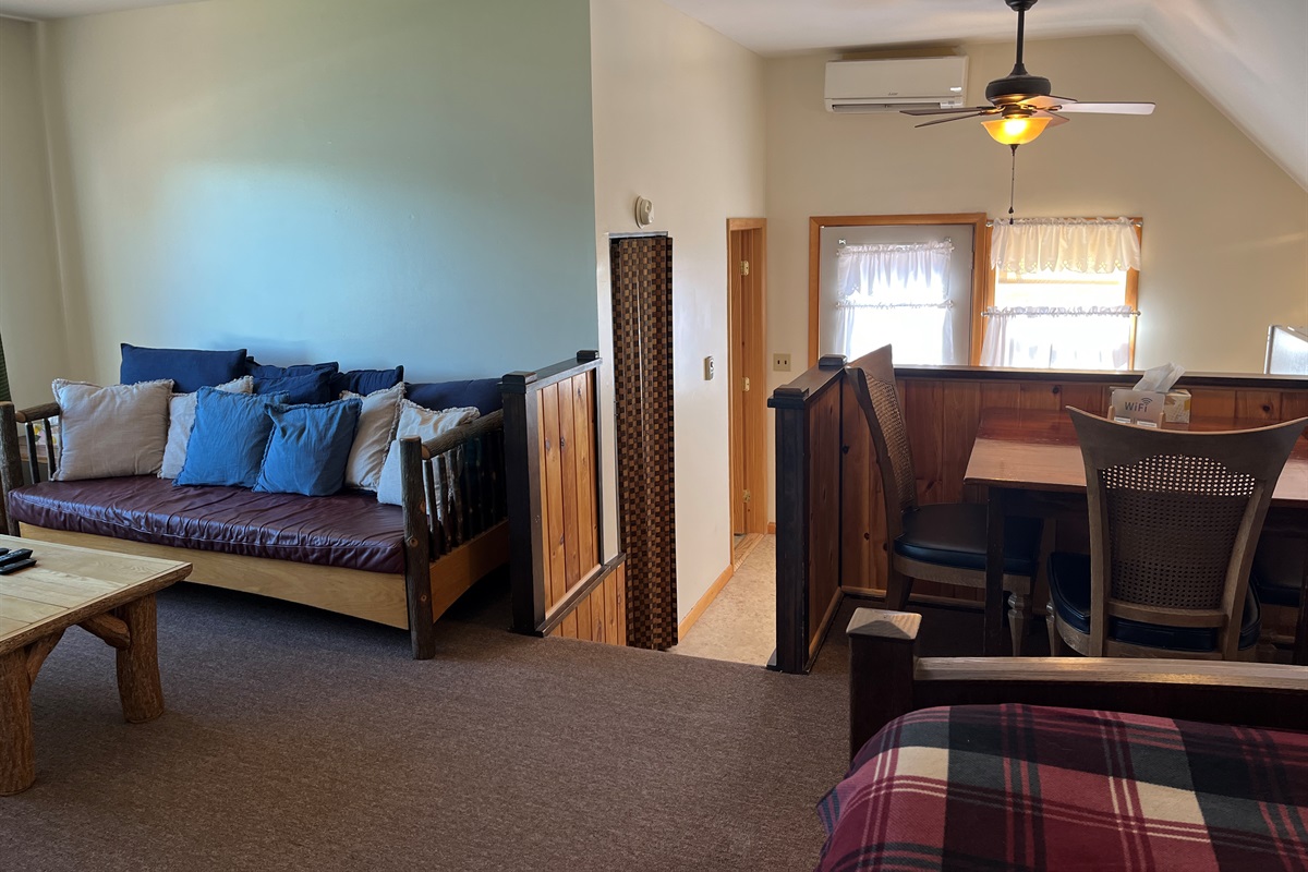 Living area, dining, double bed