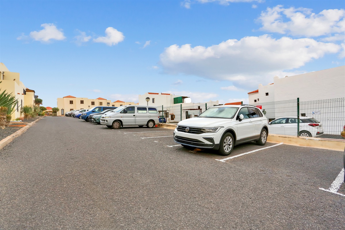 Private outdoor parking available within the complex (additional fee applies). The bungalow is also conveniently located on the main avenue, where free parking is available.