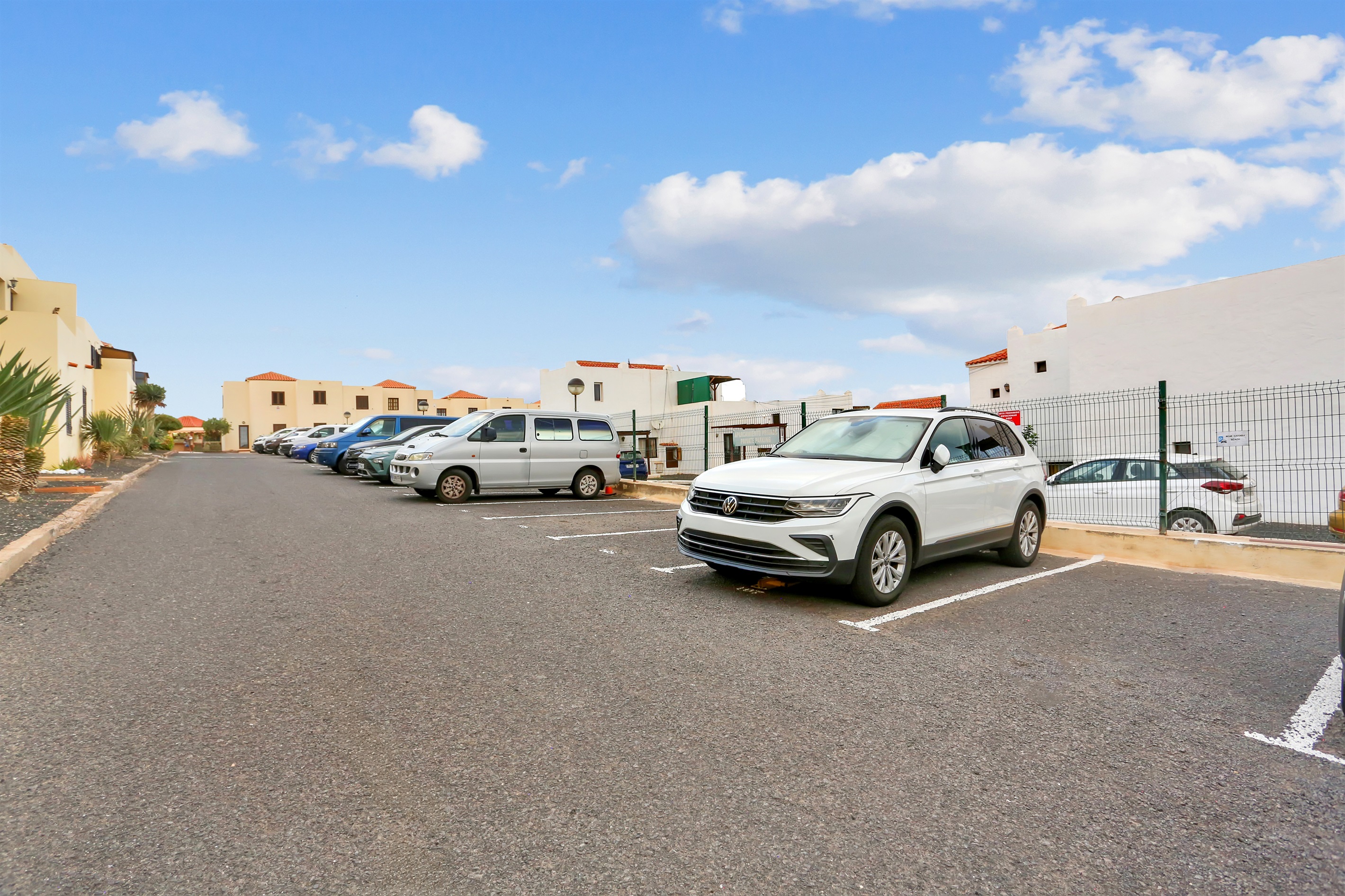 Private outdoor parking available within the complex (additional fee applies). The bungalow is also conveniently located on the main avenue, where free parking is available.