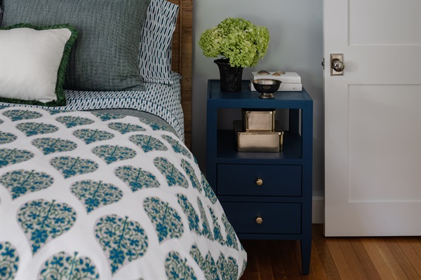 Comfortable queen bed in Bedroom 1, perfect for a good night’s sleep.