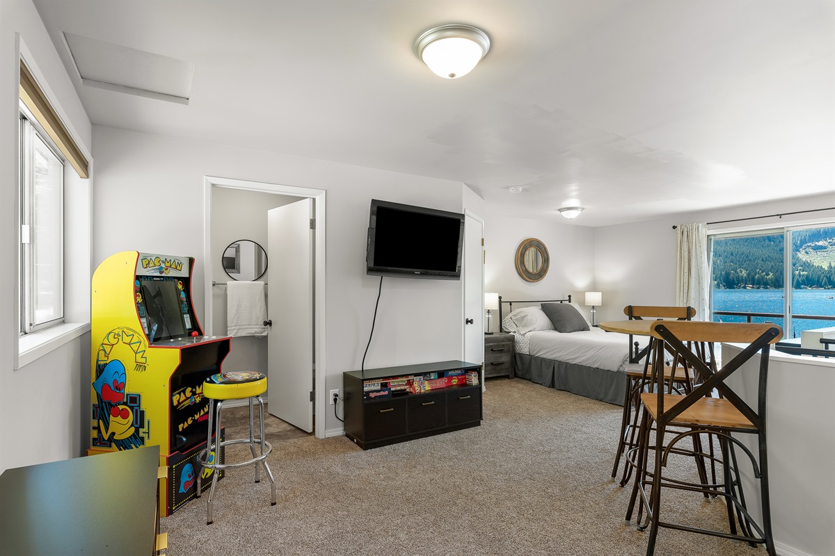 Upper-level seating area, television and game area.