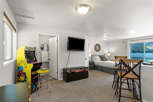 Upper-level seating area, television and game area.