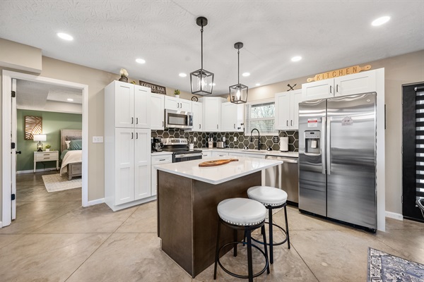 Under the kitchen sink, you’ll find a starter pack of essentials: trash bags, dishwasher pods, paper towels, and a sponge. You’ll also find a fire extinguisher and first aid kit for peace of mind.