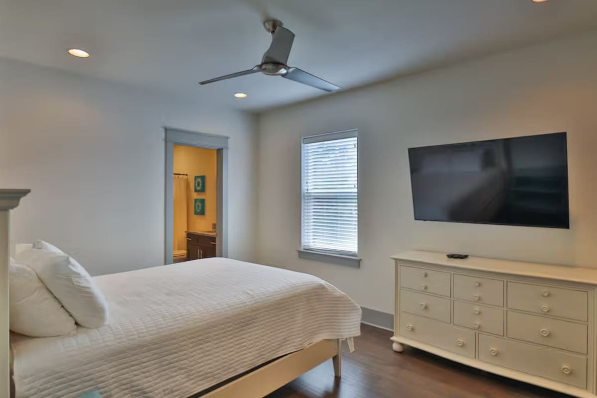 Bedroom 2 with queen bed and ensuite bathroom