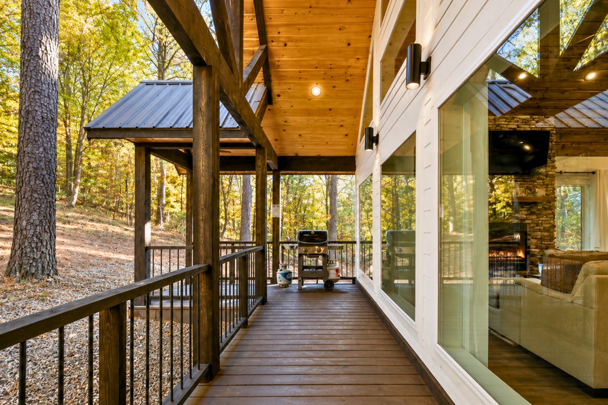Take a slow walk along the covered porch while enjoying peaceful wooded surroundings and the quiet charm of this secluded retreat.