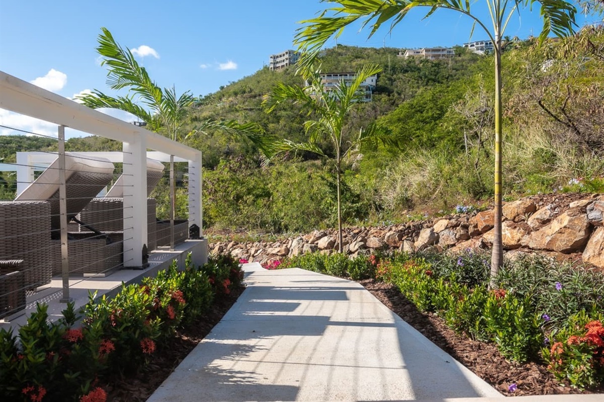 Comfortable poolside seating for a relaxing afternoon.
