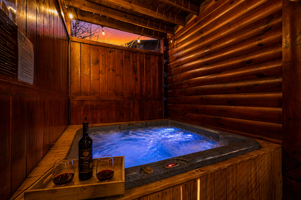 Unwind at Gatlinburg Enchantment Soak your worries away in our private, covered hot tub.In the heart of the Smokies, this cozy corner is the perfect spot for a romantic evening or a post-hike recharge. Your dream Gatlinburg getaway starts right here.