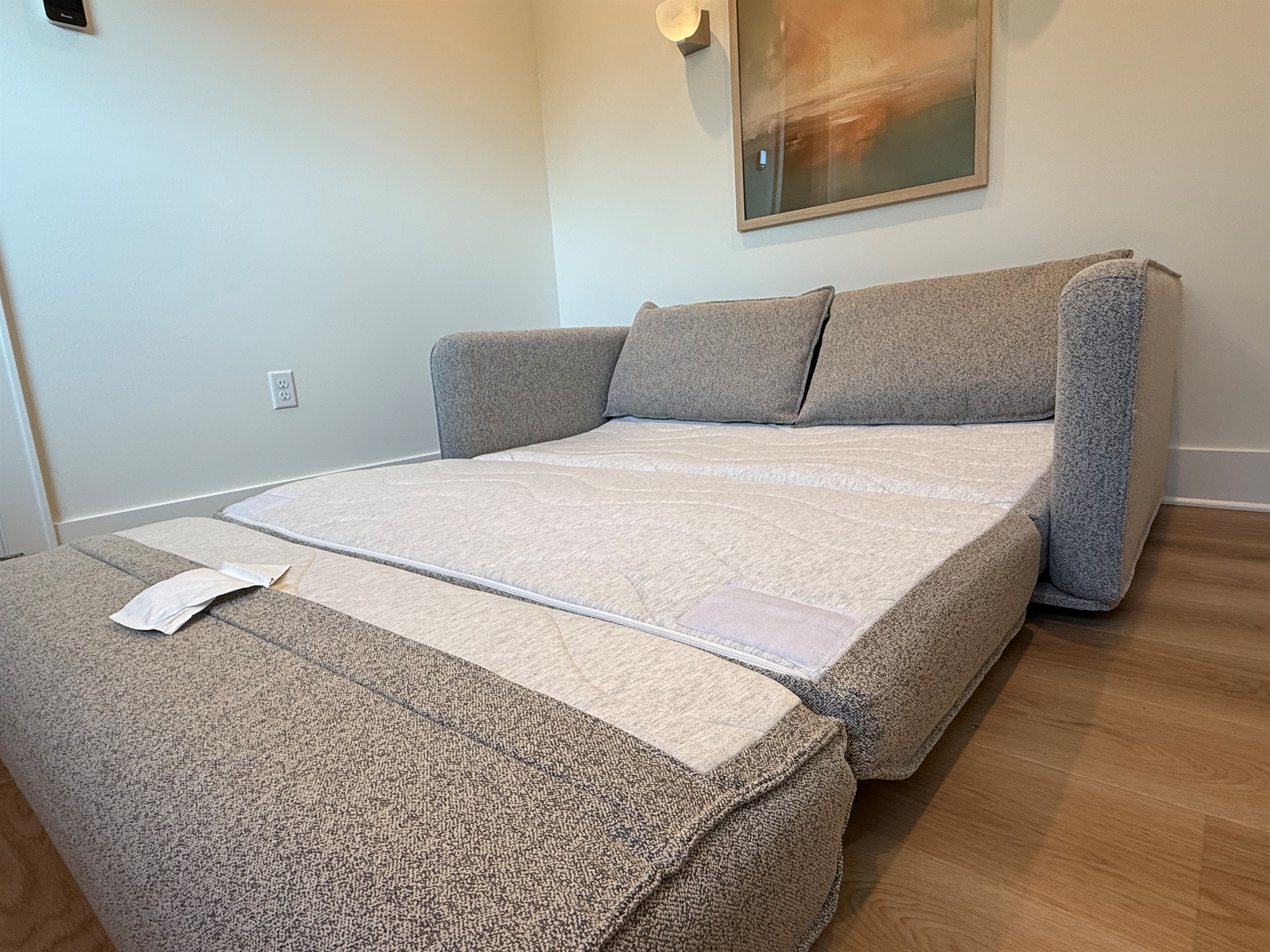This versatile pull-out couch in the landing area provides an additional queen size sleeping option for flexible group stays. 