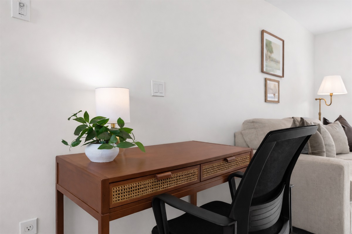 Dedicated workspace with a comfortable desk, task lighting, and a calm setting—ideal for remote work or catching up during your stay.