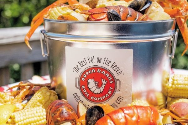 OBX Boil can come right to the house and serve you dinner!