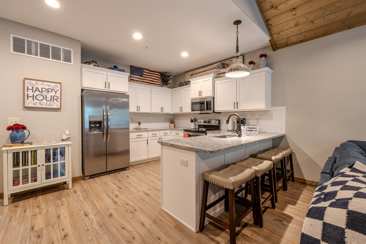 Fully stocked kitchen with island seating