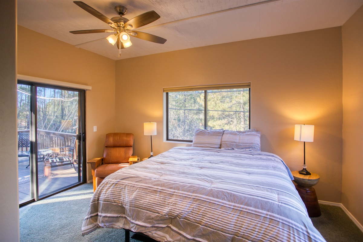 Wake up to stunning balcony views in the serene primary bedroom.