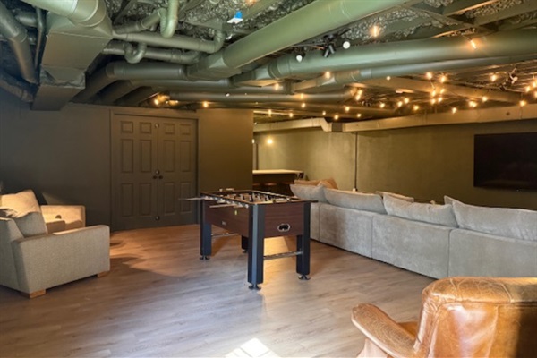 Spacious open layout perfect for relaxing, dining, and spending time together after game days or campus visits.