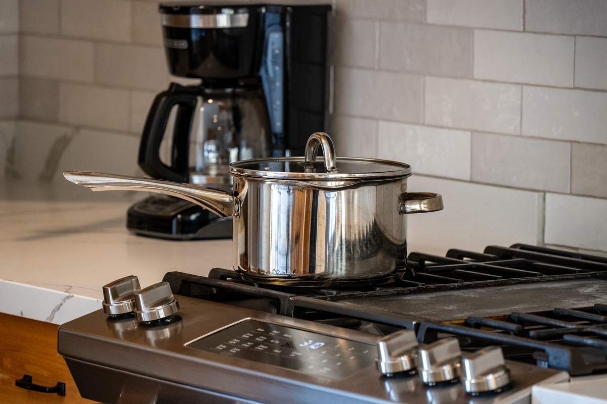 Prepare everything from morning coffee to a full dinner with the home’s convenient cooking setup with gas range.
