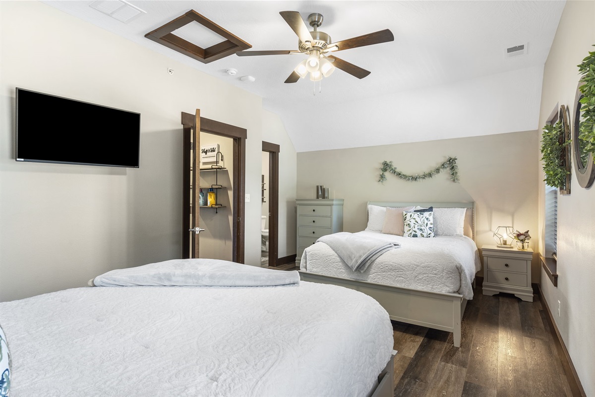 Upper level queen room with 2 beds