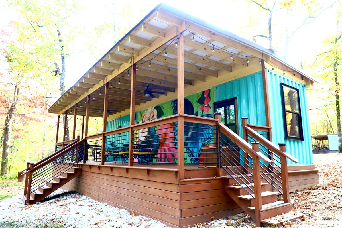 400 square feet of covered outdoor living space.  Remote controlled Edison string lights will create a cozy glow in the evenings.  Dual ceiling fans with optional LED lighting will keep the air circulating if it gets a bit warm on the deck. 