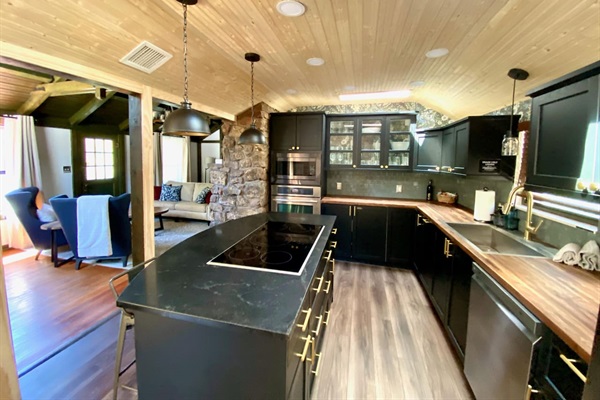 Newly renovated kitchen that is open to the living and dining areas. This is perfect for cooking and entertaining!