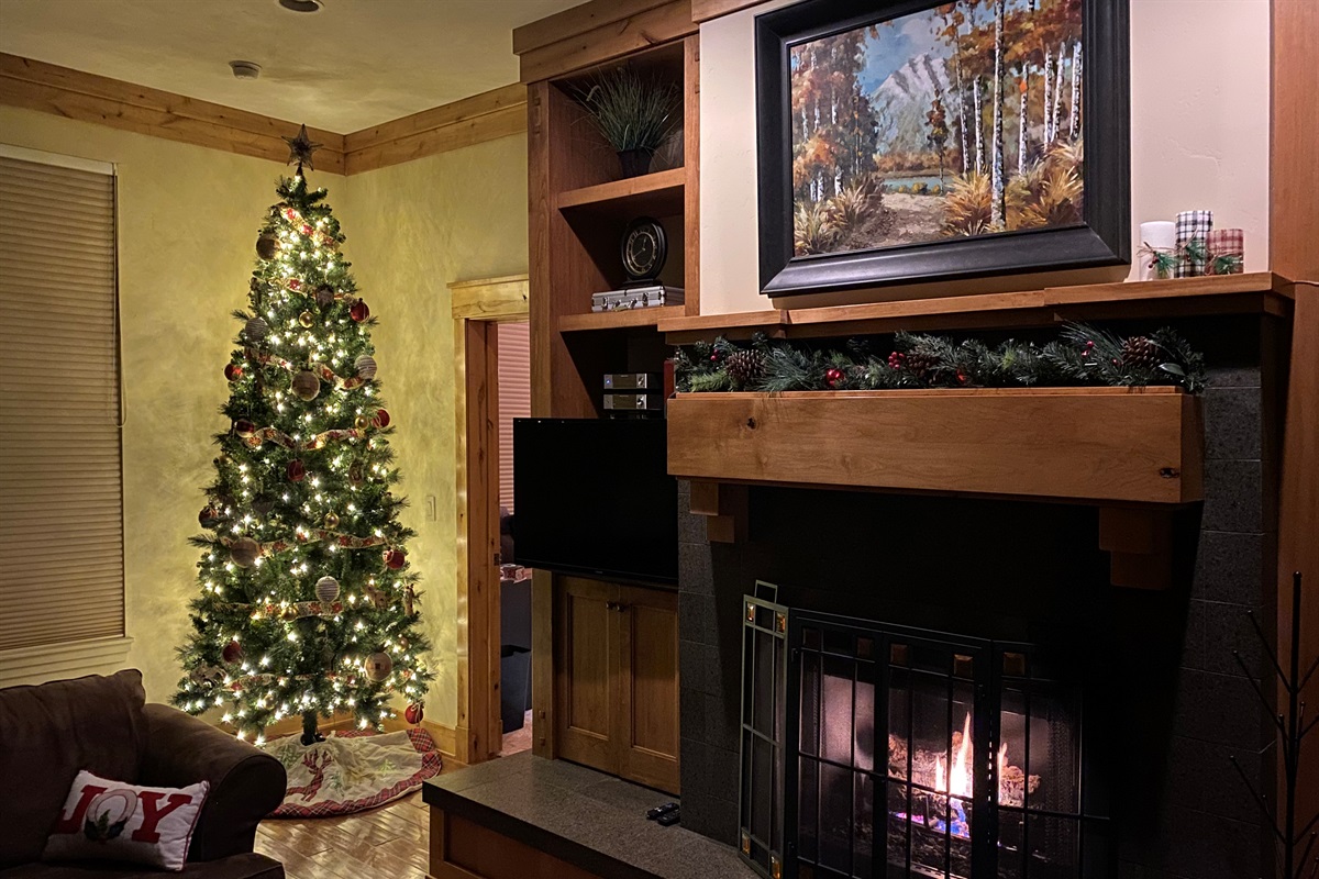 Christmas tree and decor are set up for the holiday season.