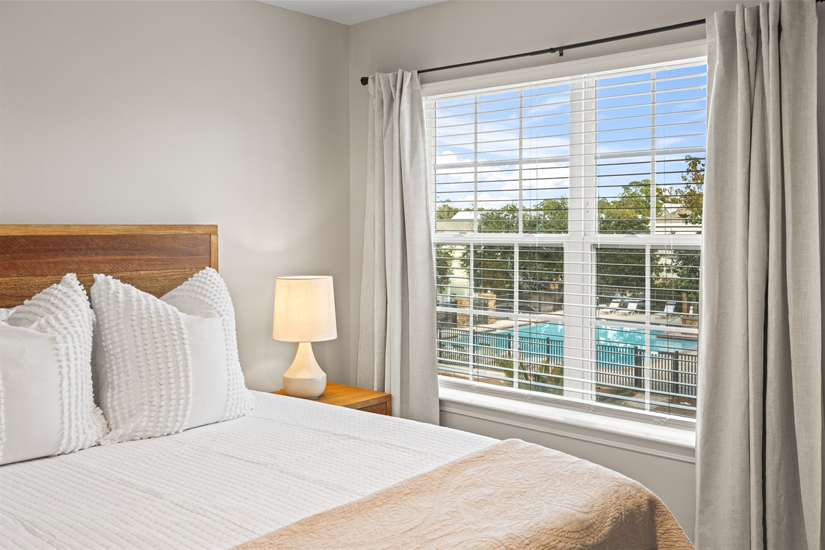 Bedroom 3: Relax in this Queen guest suite which overlooks the heated community pool directly across the street.