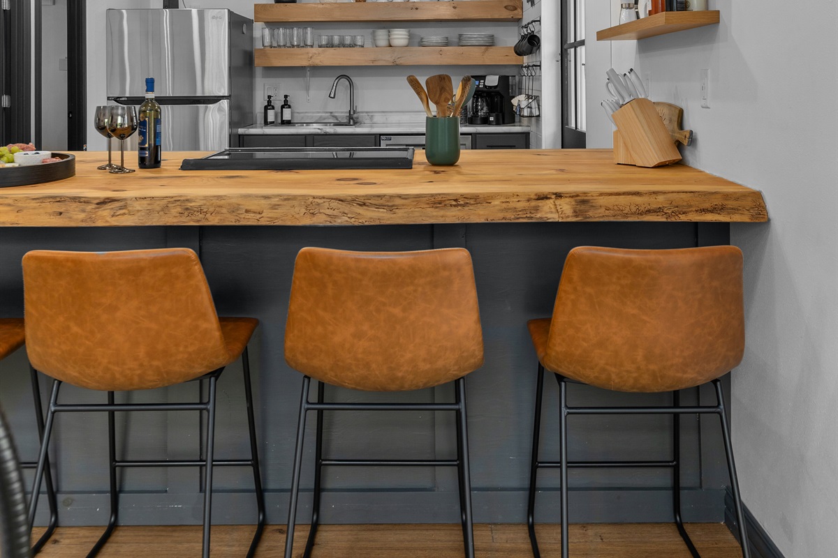 Gather around the island for coffee, cocktails, and conversation