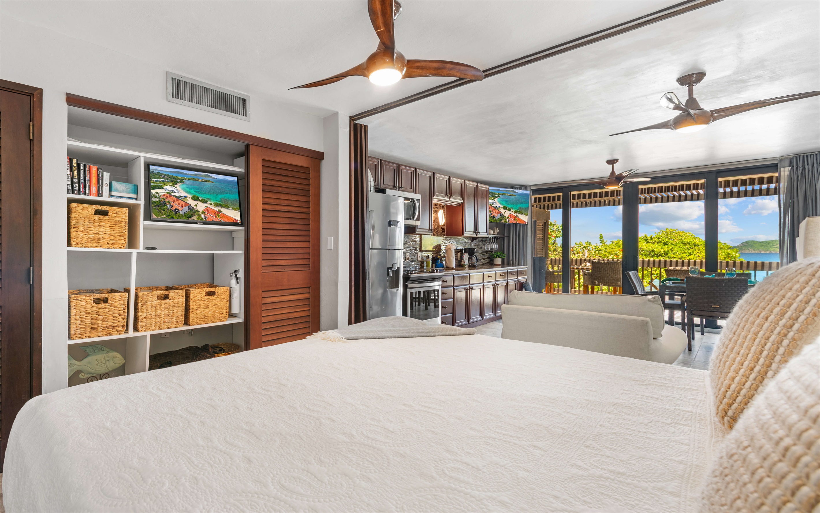 The king size bed can be open to the space, allowing for natural light 