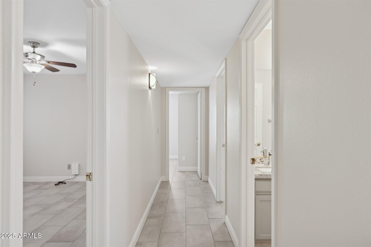 3 bedrooms + Bathrooms opposite end of home from Primary