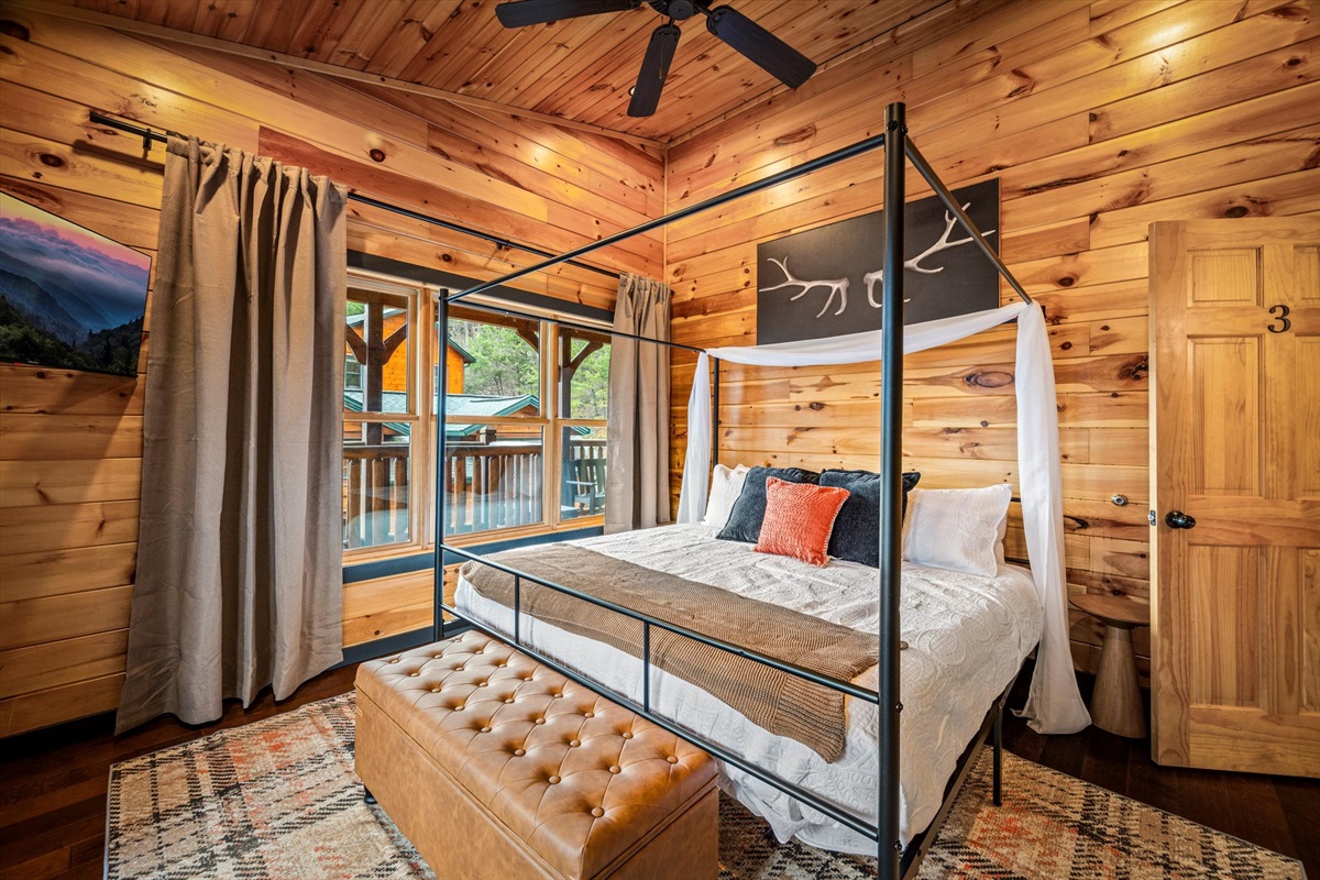 Bedroom 3 (upstairs) has a king canopy bed and private bathroom.