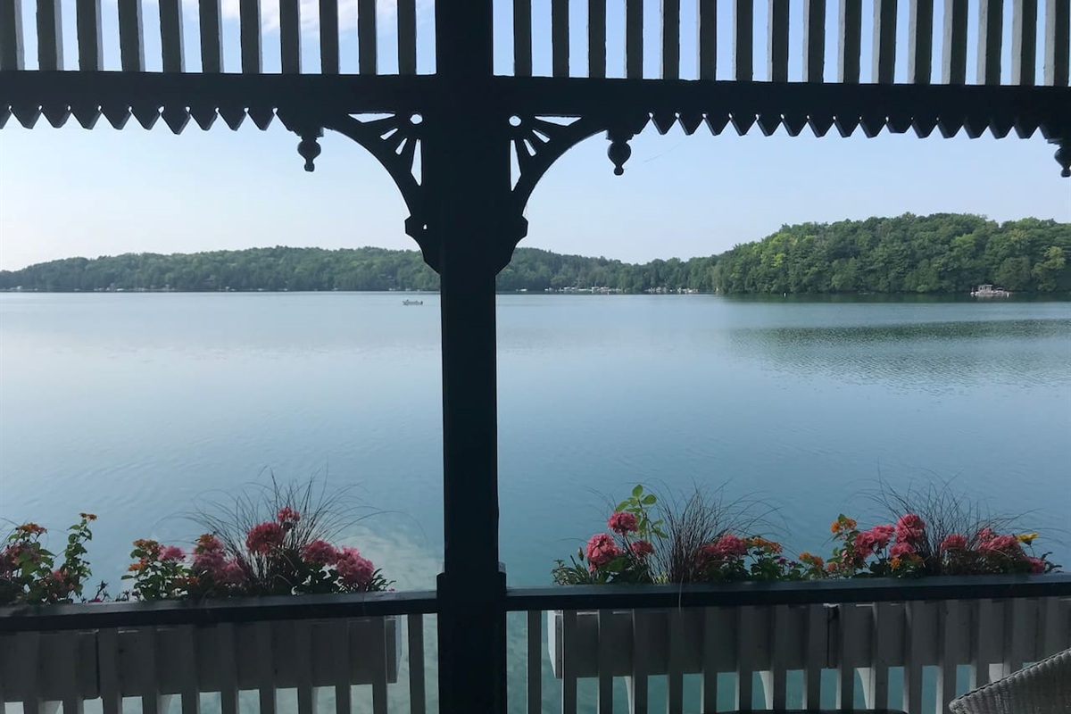 Covered outdoor space w/ lake views & peaceful surroundings