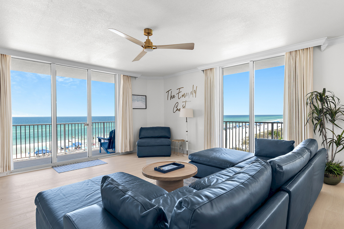 Large, Open Living Room with Gulf Views through Floor-to-Ceiling Sliding Doors - New Dining Table with Seating for 8