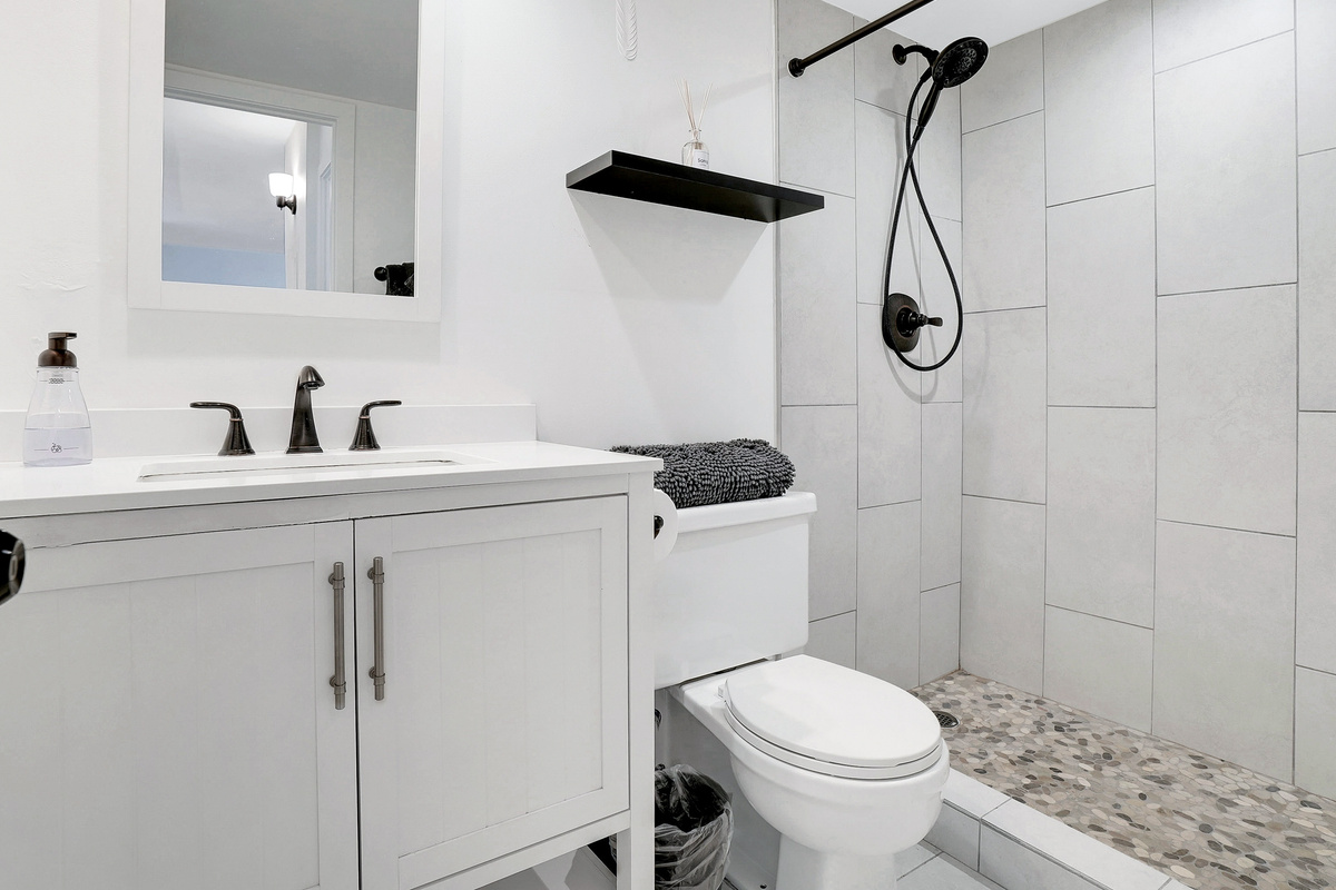 Second bathroom, also with a tile and stone walk-in shower
