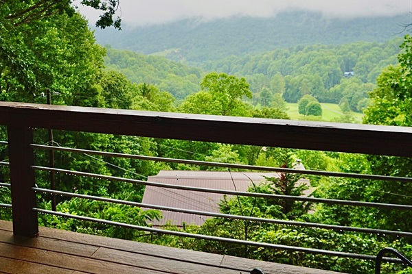 Balcony Retreat: Enjoy breathtaking mountain views from your private outdoor oasis!