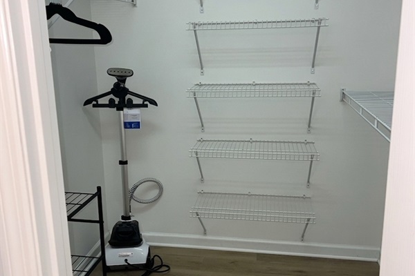 Clothes steamer and iron stocked in the closet for a crisp finish.