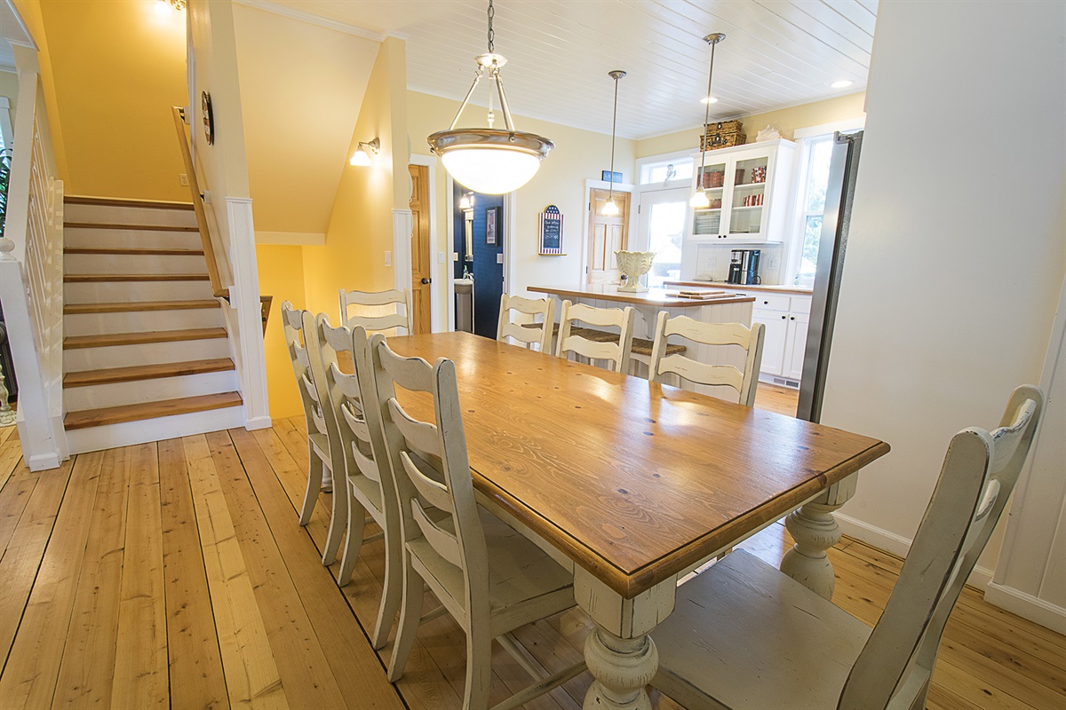 Gather around the farmhouse table for 8, with additional seating at the kitchen island for family and friends.