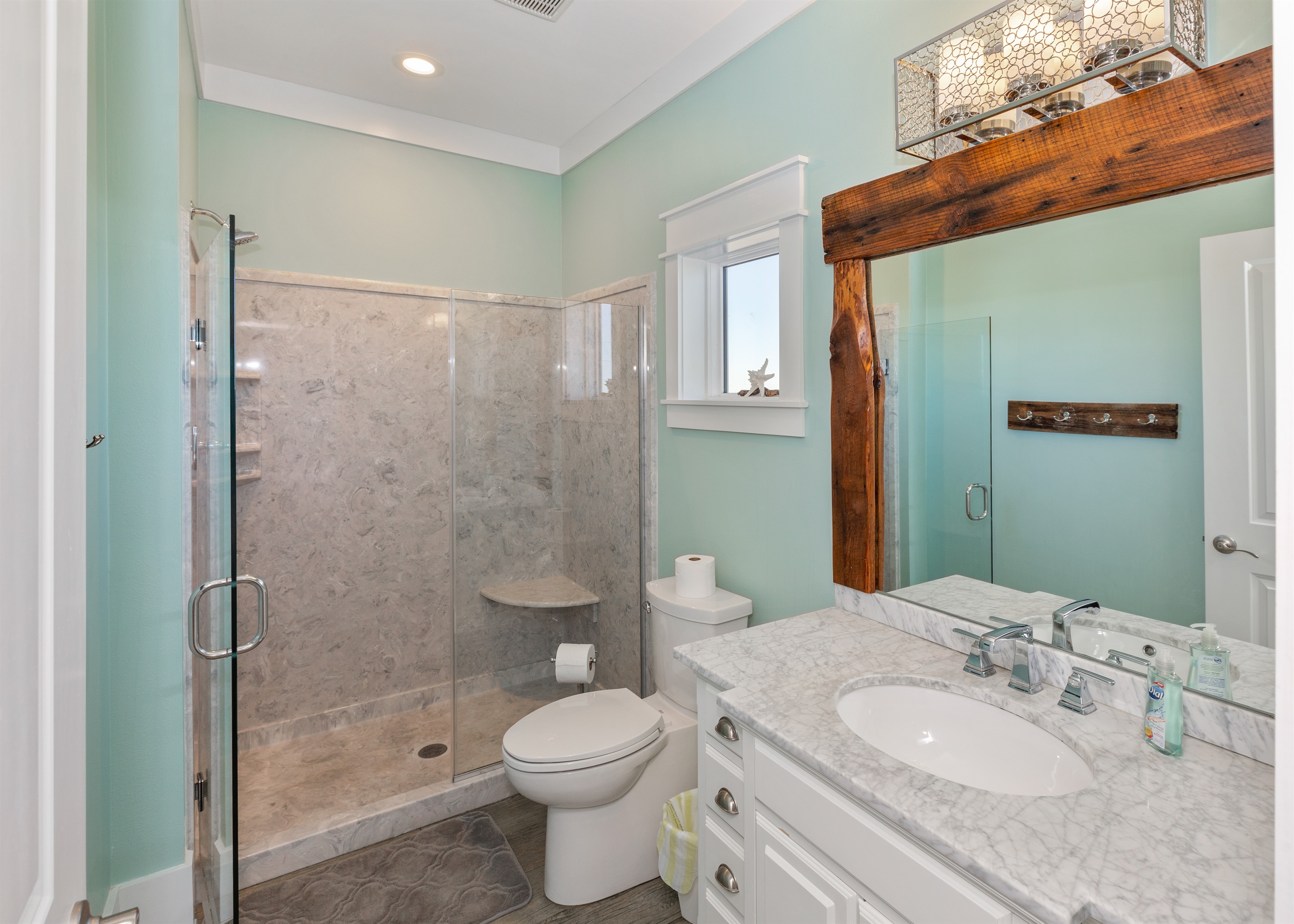 Third floor Queen suite with private bath boasts coastal chic decor.