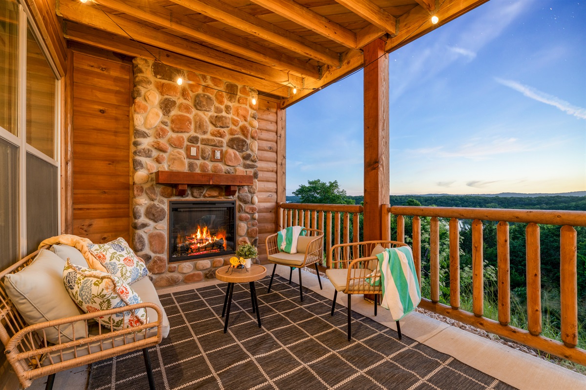 Cozy fireside seating outdoors—the heart of evenings at Water & Woods.