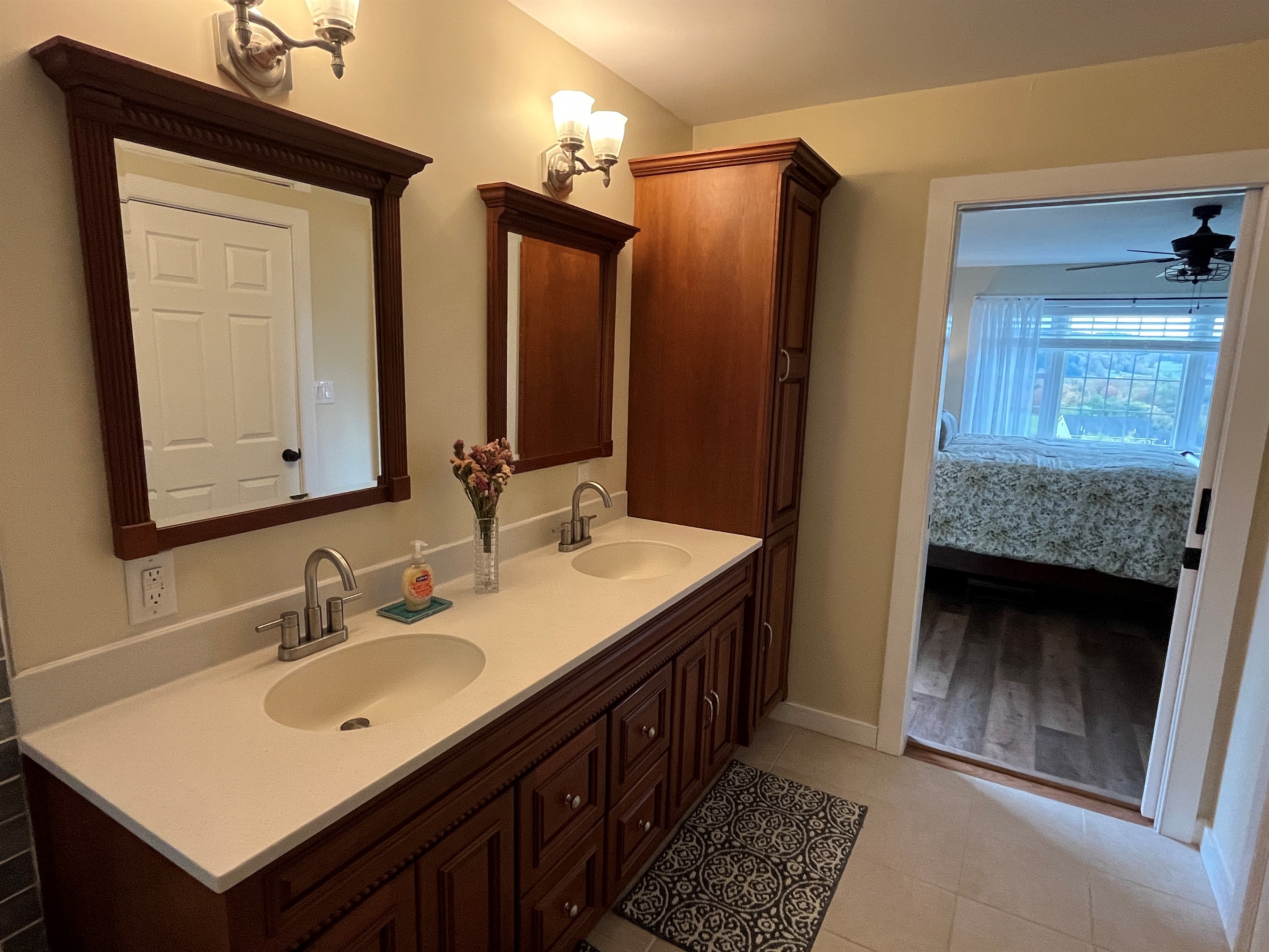 Primary bath with jetted tub and frameless glass shower