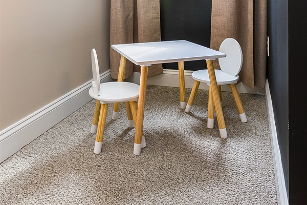 A little table and chairs, just right for crafts, coloring, or board games.