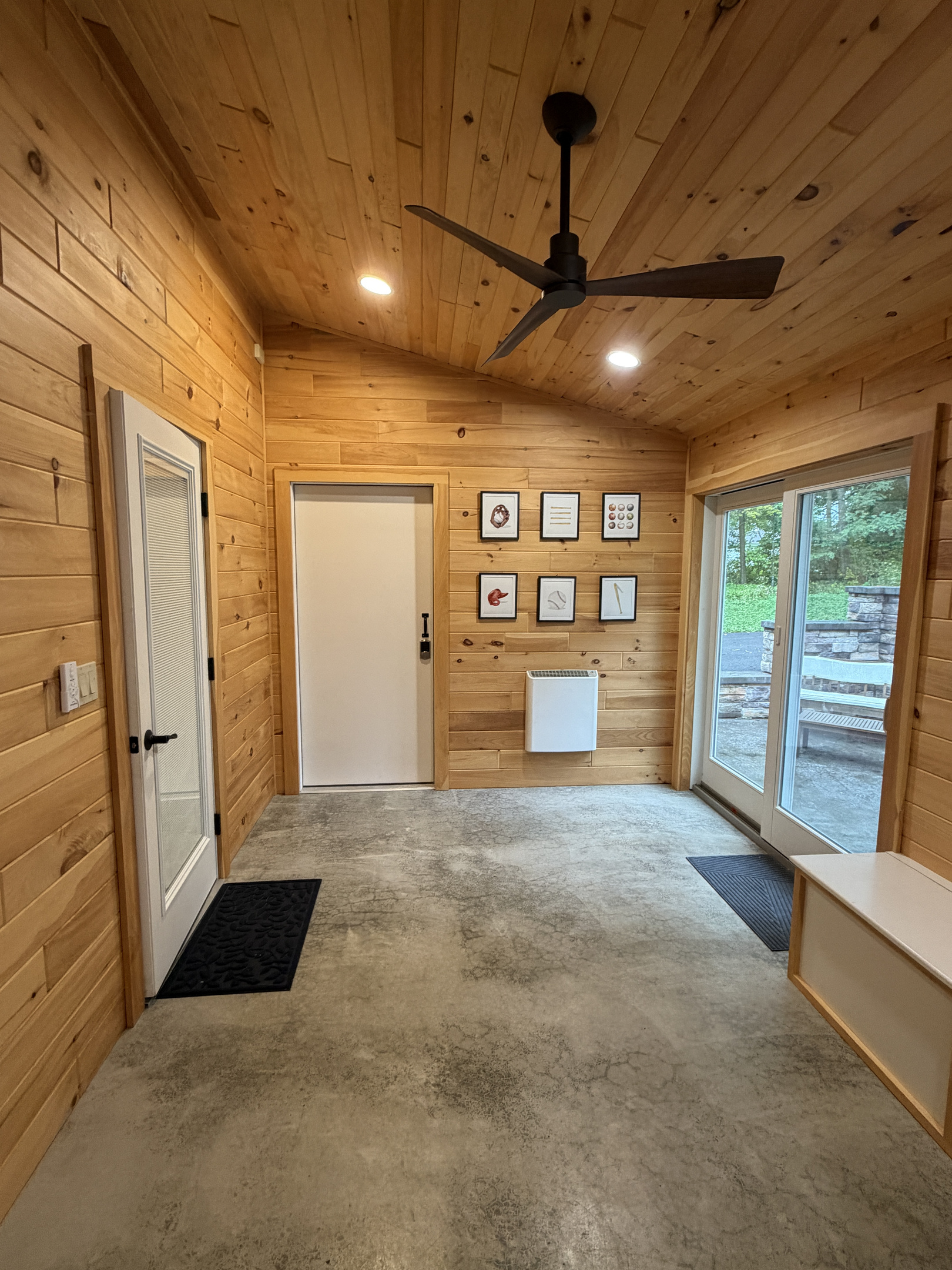 Mudroom with sliders to back patio