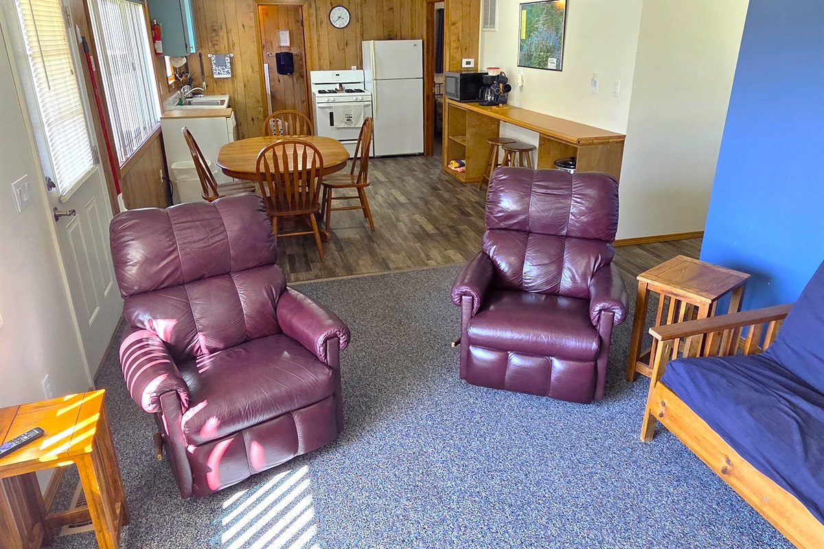 Relax in the recliners and enjoy the open area between the kitchen and living room.